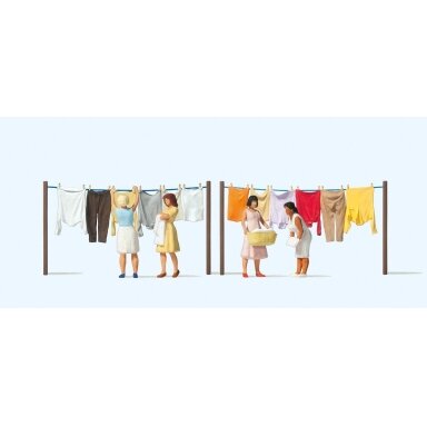Women hanging laundry